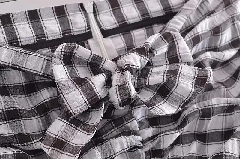 PLEATED CHECK MIDI SKIRT